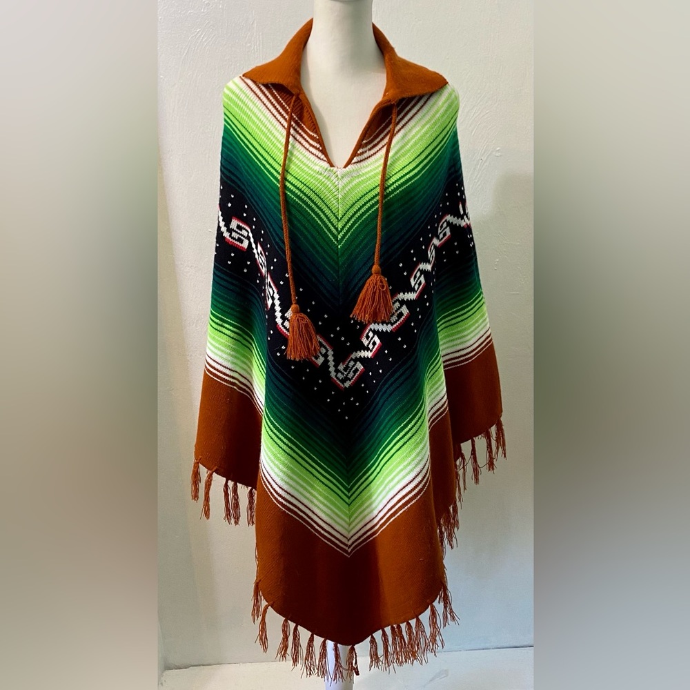 Vintage Nelly brown and green Peruvian poncho.Vibrant colors and fringe.Size OS